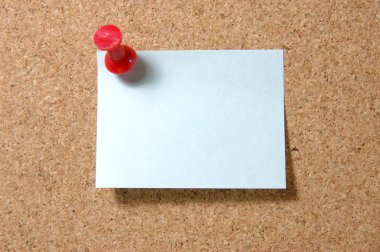 Post-it note with pushpin on corkboard clipart