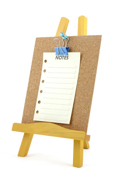 Note épinglée sur carton-liège avec support en bois — Photo