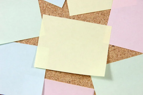 Close up of post-it notes on corkboard — Stock Photo, Image