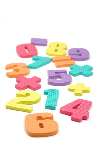 Foam numbers and maths symbols — Stock Photo, Image