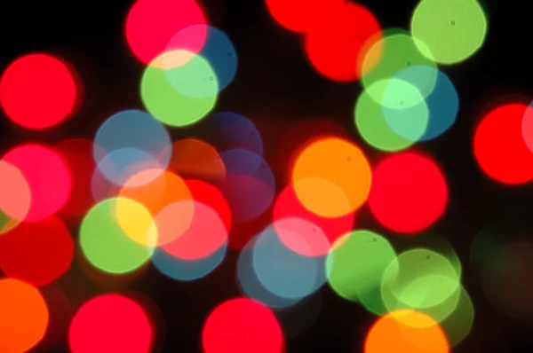Christmas lights onscherpe achtergrond — Stockfoto