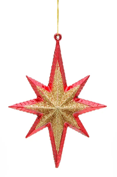 Рождественская звезда в красном и золотом — стоковое фото