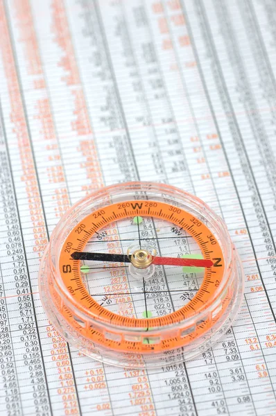 Kompas na giełdzie numery — Zdjęcie stockowe