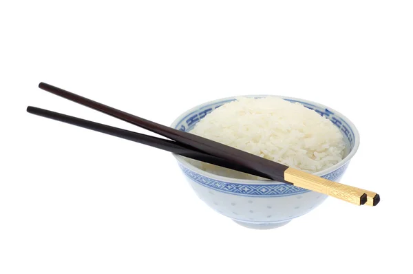 Bowl of cooked rice with chopsticks — Stock Photo, Image