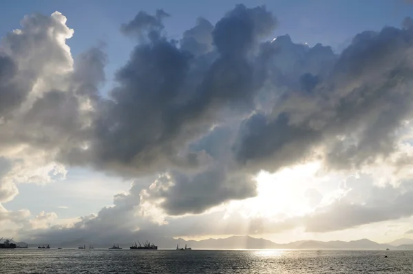 stock image Sun rays through clouds