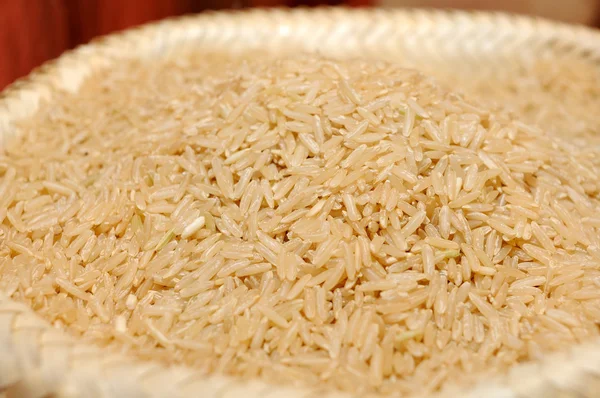 Hnědá rýže v pytli — Stock fotografie