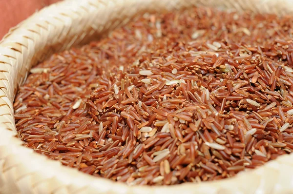 Rött ris i säck — Stockfoto