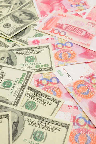 Dólar estadounidense vs yuan de China — Foto de Stock