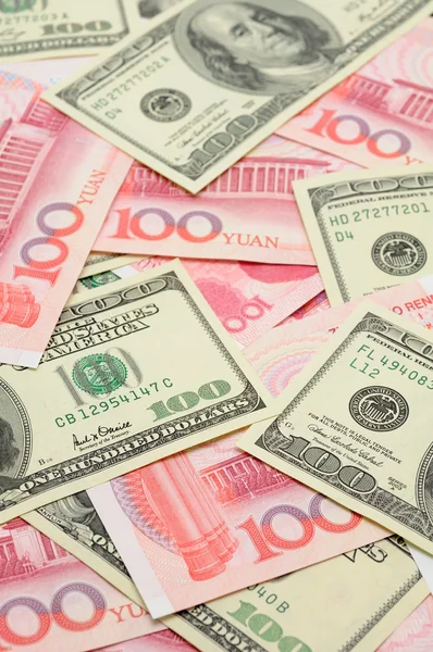 Dólar dos EUA e China yuan closeup — Fotografia de Stock