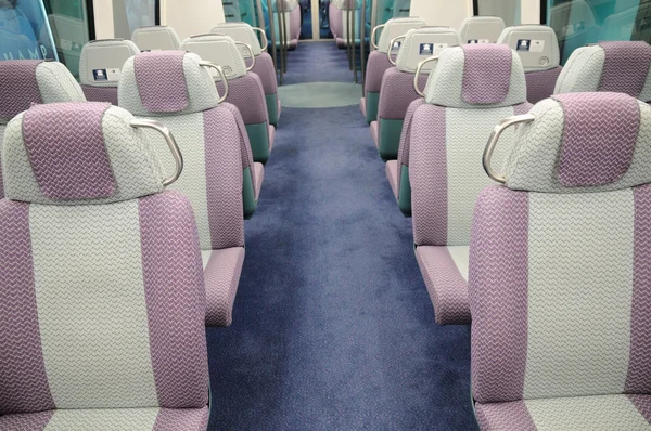 Assentos em um trem de passageiros — Fotografia de Stock