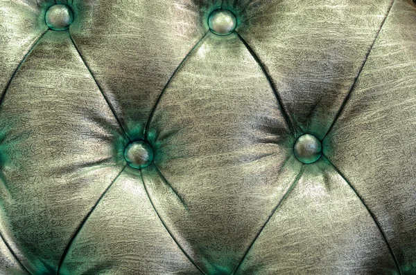 Yeşil düğmeli deri desen — Stok fotoğraf