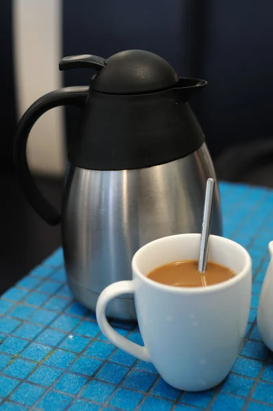 Kaffekopp och flaska — Stockfoto