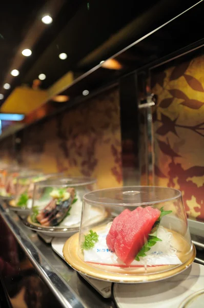 Conveyor belt sushi — Stockfoto