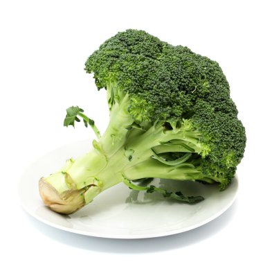 Beyaz bir tabak üzerinde yeşil brokoli