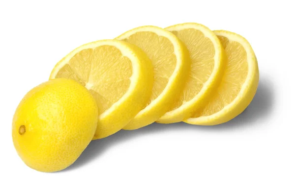 Schneiden Sie auf Stücke gelbe Zitrone — Stockfoto