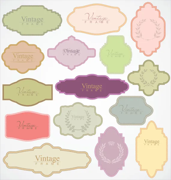 Set of ornate vector frames and labels — Stock Vector