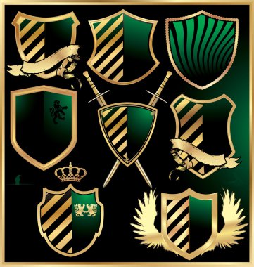 Gold and green shields set clipart