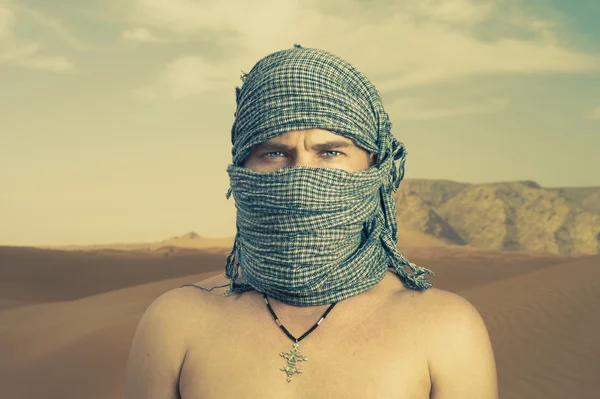 stock image Brutal man in desert