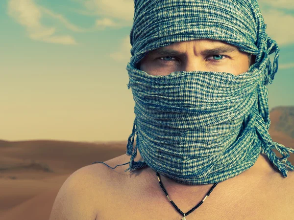 stock image Brutal man in desert