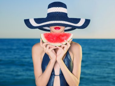 Young lady at sea with watermelon clipart