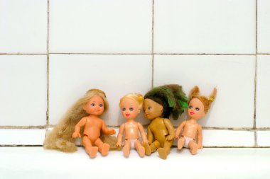 Dolls on the bath edge clipart