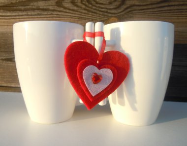 Two coffee cups and red heart clipart