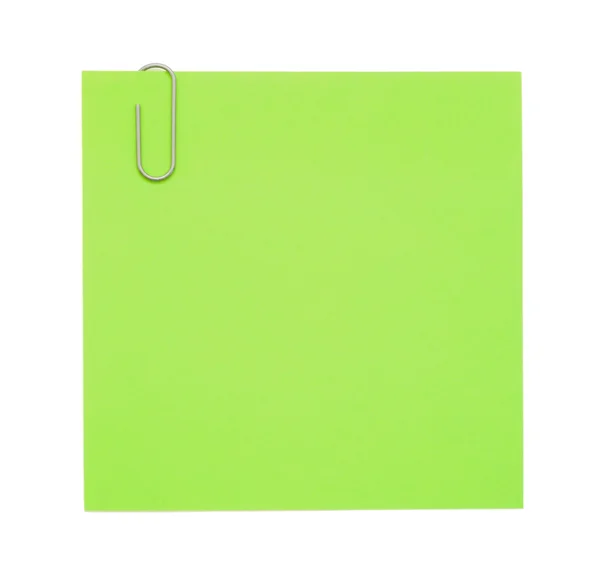 Grüner Zettel mit Büroklammer — Stockfoto