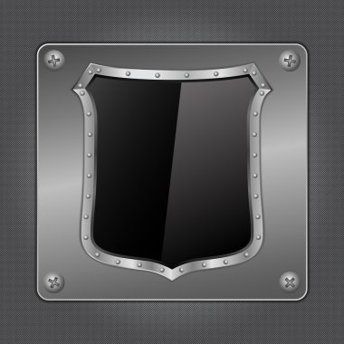 Black shield on metal board clipart