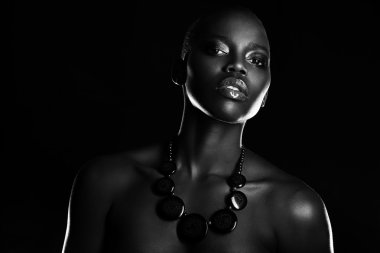Black African young sexy fashion model studio portrait isolated white black clipart