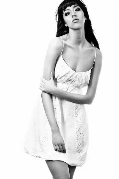 Porträt einer jungen sexy Frau auf weißem Hintergrund. — Stockfoto