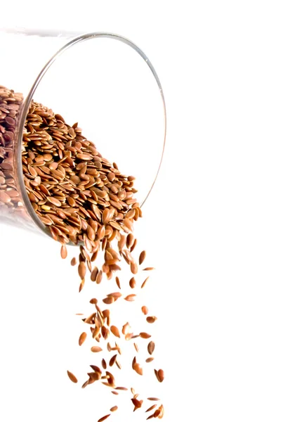 Glass and seeds — Stock Photo, Image