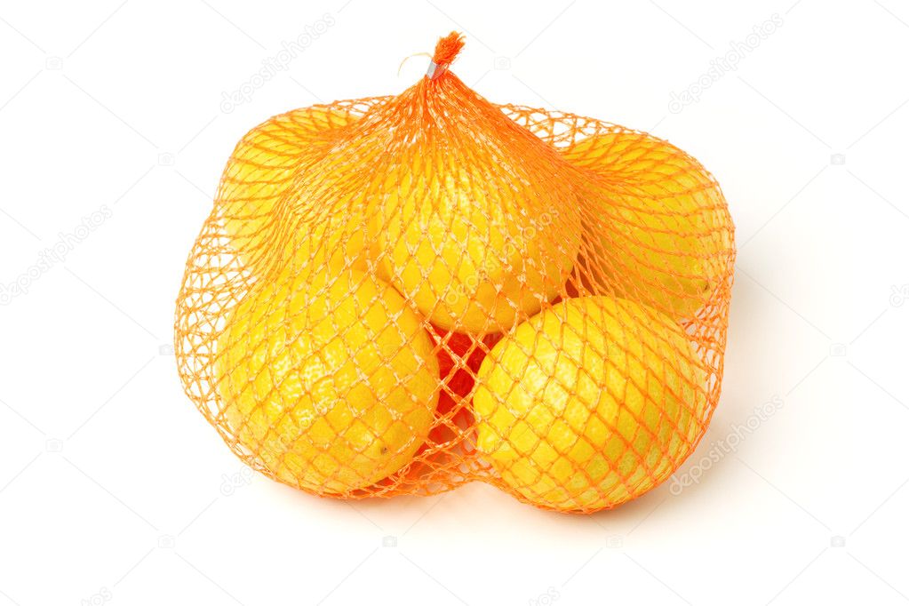 Fresh lemons in plastic sack