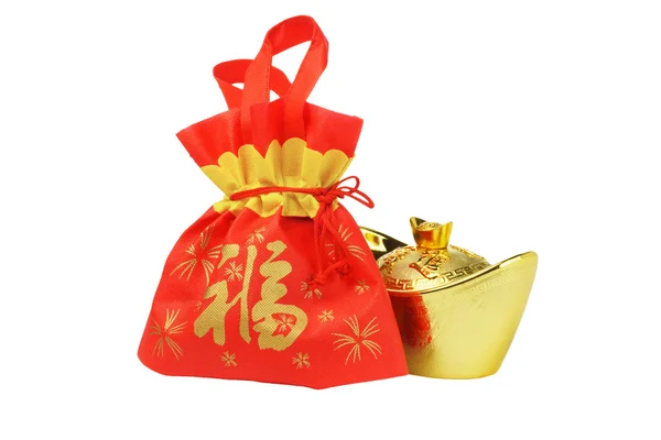 Chiński Nowy rok ofiara worek i złota inpgot ornament — Zdjęcie stockowe