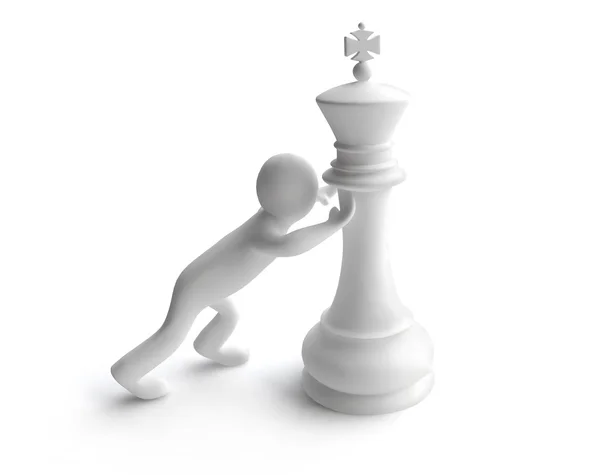 Mann schiebt eine Schachkönigsfigur — Stockfoto