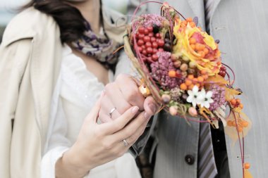 Bride and groom's hands clipart