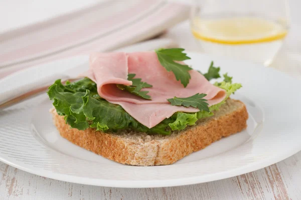 Toast with lettuce, ham and parsley — Stock Photo, Image