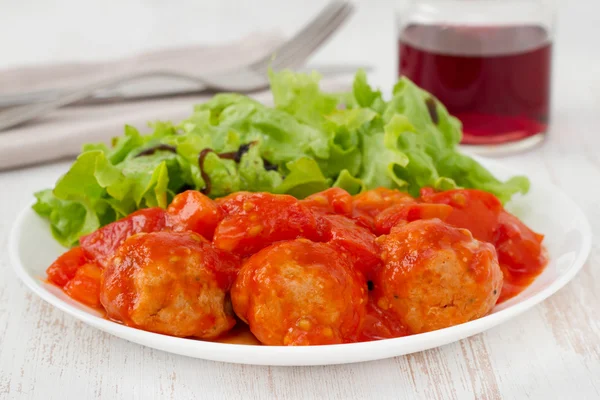 stock image Turkey meatballs with tomato paste on the plate