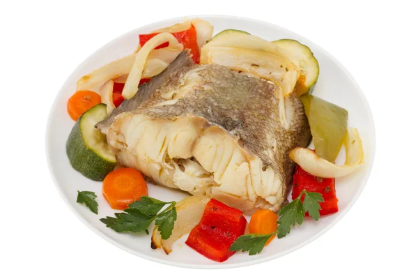 Gekookte vis met groenten op de plaat — Stockfoto