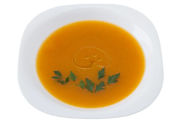 Kürbissuppe mit Petersilie auf weißem Teller — Stockfoto