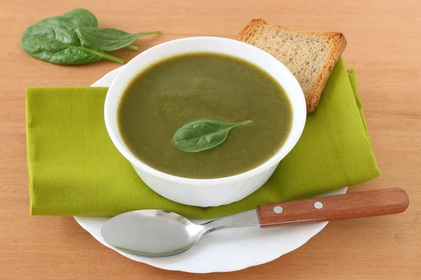 Spinach soup in the white bowl — Stock Photo, Image
