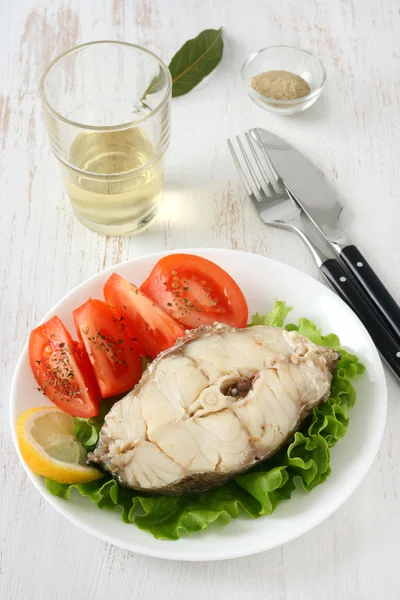 Boiled fish with glass of wine — Stock Photo, Image