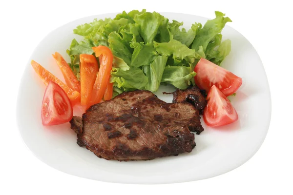 Smażone wołowiny z sałatką — Zdjęcie stockowe