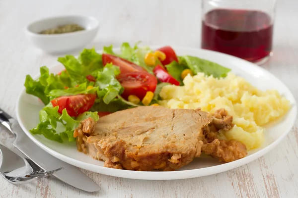 Pork with mashed potato and salad — Stock Photo, Image