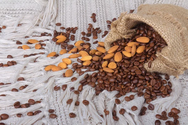Bag of coffee beans and almonds — Stock Photo, Image