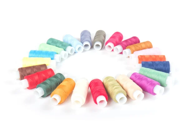 Circle of colorful threads on a white — Stock Photo, Image