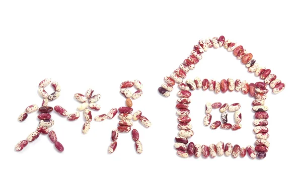 Haricot beans in the shape of a house and two — Stock Photo, Image