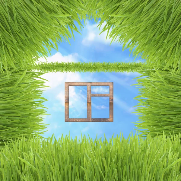 Conceptual verde casa de hierba en el cielo fondo — Foto de Stock