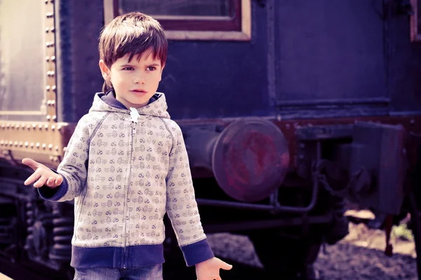 Boy and an old train — Stock Photo, Image