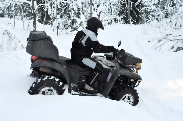 stock image All-terrain vehicle got stuck in snow