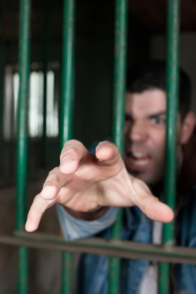 Homem numa cela — Fotografia de Stock